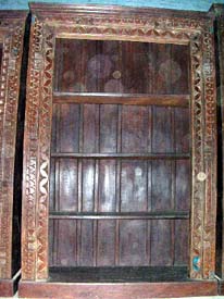 wooden craved bookshelf